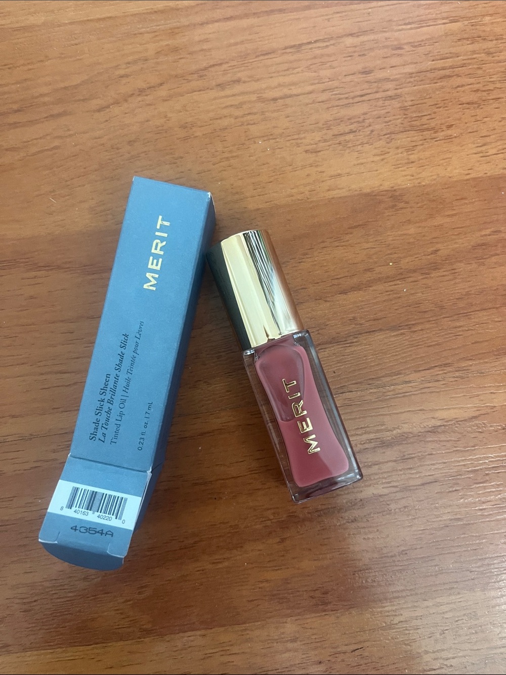 Merit Shade Sleek Sheen Tinted Lip Oil in Shade Pointelle